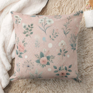 Ländliches rosa Blumenmuster mit weißen Blüten und Kissen