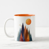 Landschaft mit Bergen und Sonne Zweifarbige Tasse (Links)