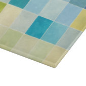 Landschaft mit mehrfarbigen, pixeligen Quadraten Schneidebrett (Ecke)