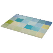Landschaft mit mehrfarbigen, pixeligen Quadraten Schneidebrett (Ecke)