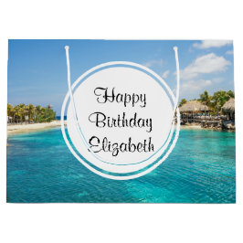 Landschaftlicher tropischer Strand mit Strohhütten Große Geschenktüte