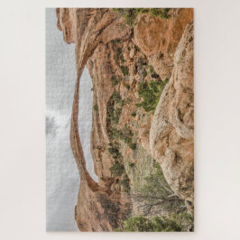 Landschaftsbogen gegen einen bewölkten Himmel - 10 Puzzle