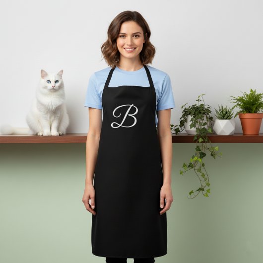 Lange massive schwarze monogrammierte Schürze