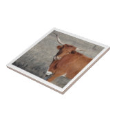 Langhaarkuh leckt ihre Nase Fliese (Seite)