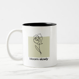 Langsam blühen zweifarbige tasse