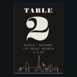 Las vegas Casino Skyline Wedding Tischnummer<br><div class="desc">Eine lustige und moderne Las Vegas Casino Skyline Wedding Tischnummer Karte, die eine individuelle Touch zu Ihrem Event in Las Vegas hinzufügen wird! Diese Tischnummer bietet ein modernes Las Vegas Skyline-Rendering und einen vollständig anpassbaren Schriftart und Text auf grafischem schwarzem Hintergrund. Perfekt für ein trendiges, modernes oder klassisches traditionelles Event...</div>