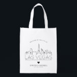 Las Vegas Wedding | Stilisierte Skyline Wiederverwendbare Einkaufstasche<br><div class="desc">Eine einzigartige Hochzeitstasche für eine Hochzeit in der schönen Stadt Las Vegas. Diese Tasche zeigt die einzigartige Skyline der Stadt mit ihrem Namen darunter. Anschließend erhalten Sie Informationen zu Ihrem Hochzeitstag in einem passenden,  offenen Stil.</div>