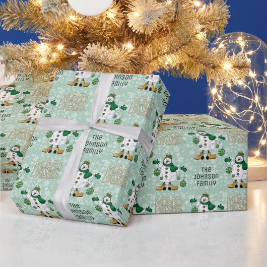 Lass es schneit, kleiner grüner Schneemann. Geschenkpapier (Feiertage)