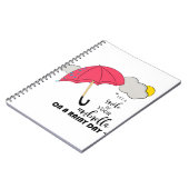 lassen Sie ein Lächeln Ihr Regenschirm an einem Notizblock (Linke Seite)