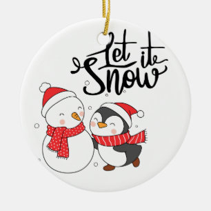 Lassen Sie es mit Pinguin und Snowman auf einem Keramik Ornament