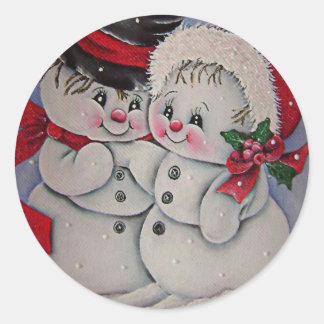 Lasst es schneien. Schneemann seine Freundin Runder Aufkleber