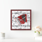 Lasst uns Polka, rote Akkordeon auf Noten. Quadratische Wanduhr (Zuhause)