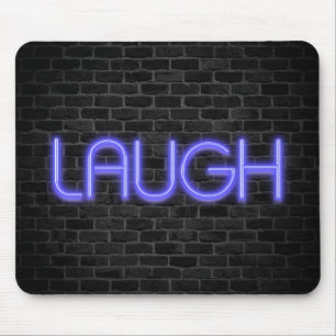 LAUGH Text in Neonleuchten auf Backstein Mousepad