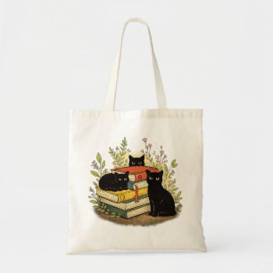 Launische schwarze Katzen stapeln Bücher Florale K Tragetasche