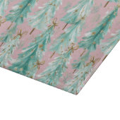 Launische Türkis-Weihnachtsbäume auf Rosa  Schneidebrett (Ecke)