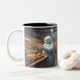 Launischer Schneemann trinkt Kakao im Supermarkt Zweifarbige Tasse