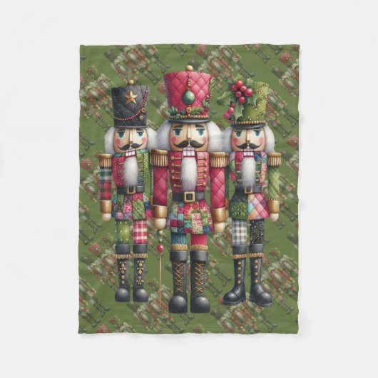 Launisches Patchwork-Weihnachts-Nussknacker-Trio Fleecedecke (Vorderseite)