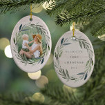 Laurel Wreath | Weihnachten in Foto und Caption Keramik Ornament<br><div class="desc">Elegante zweiseitige Foto-Ornamente umrahmen ein beliebtes Foto mit einem ovalen Kranz von grünen Aquarelllaurel Blätter auf einem hellen Holzhintergrund. Personalisieren Sie den Rücken mit Ihrer eigenen Beschriftung (mit "[name's] first Christmas" und dem Jahr gezeigt. Ideal für die erste Weihnachtsfeier, die erste verheiratete Weihnachtsfeier, oder zum Gedenken an ein besonderes Jahr....</div>