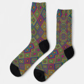 Lebendige kniehohe Socken mit einem farbenfrohen (Linkes Detail)