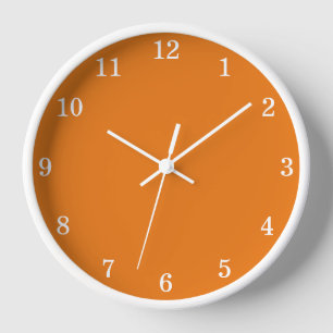 Lebendige orangefarbene minimalistische Wanduhr