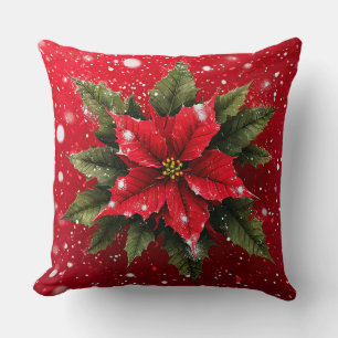 Lebendige Poinsettienblume auf festlichem Rot Kissen