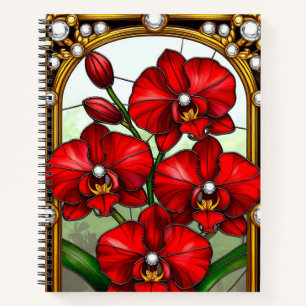 Lebendige rote Orchideen in ornamentaler goldener Notizblock