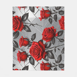Lebendige rote Rosen auf einem metallischen silber Fleecedecke