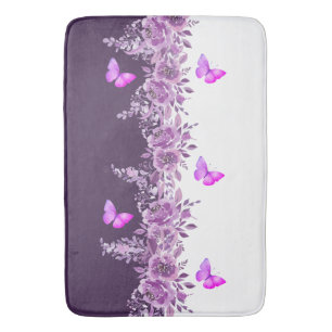 Lebendiger lila Schmetterling und botanisches Desi Badematte