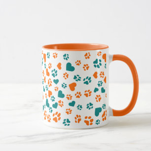 Lebendiger Orange- und Türkis-Pfotenabdruck – Gesc Tasse