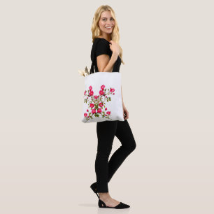 Lebendiger rosa Rosenzweig mit Blüten und Knospen Tasche