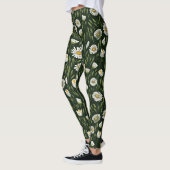 Lebendiges Gänseblümchenmuster mit üppigen grünen Leggings (Links)