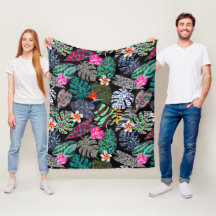 Lebendiges tropisches Blätter- und Blumenmuster