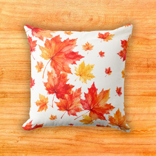 Lebendiges Wasserfarbenmuster mit herbstlicher Aho Kissen