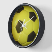 Lebhafte Gelb- und Schwarzfußballkunst Wanduhr (Winkel)