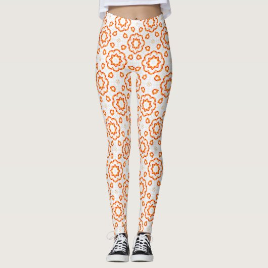 Lebhafte geometrische orangefarbene Blumenleggings Leggings (Vorderseite)