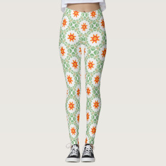 Lebhafte grüne und orangefarbene Blumen-Blatt-Must Leggings