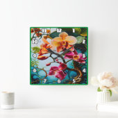 Lebhafte Orchideen blühen im tropischen Paradies Quadratische Wanduhr (Zuhause)