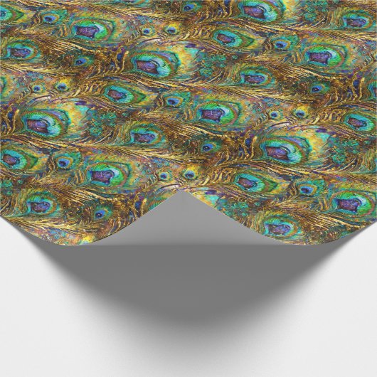 Lebhafte Pfauenfeathers auf Gold Geschenkpapier (Ecke)