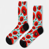 Lebhafte rote Pflaumen auf einem hellblauen Hinter Socken (Linkes Detail)