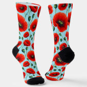 Lebhafte rote Pflaumen auf einem hellblauen Hinter Socken (Gewinkelt)