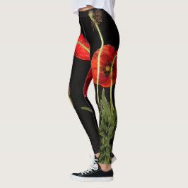 Lebhafte rote Pflaumen auf schwarzen Leggings