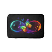 Lebhafte Unendlichkeit mit Regenbogenschmetterling Badematte (Vorderseite)