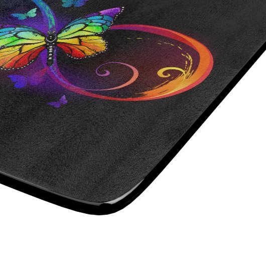 Lebhafte Unendlichkeit mit Regenbogenschmetterling Schneidebrett (Ecke)