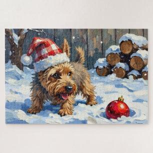 Lebhafter Cairn Terrier Hund gräbt nach Weihnachte Puzzle