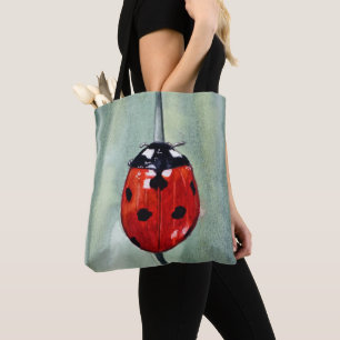 Lebhafter Ladybug auf grünem Hintergrund, Aquarell Tasche