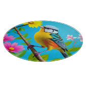 Lebhafter Songbird auf einem blühenden Zweig Schneidebrett (Ecke)