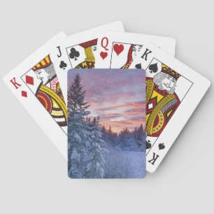 Lebhafter Sonnenuntergang malt den Himmel über win Spielkarten