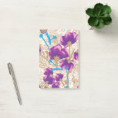 Lebhaftes Blumenmuster mit lila und blauem f Post-it Klebezettel (Büro)