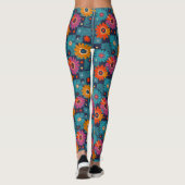 Lebhaftes Retro-Blumenmuster mit Aquamarinen Quadr Leggings (Rückseite)