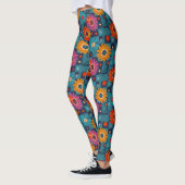 Lebhaftes Retro-Blumenmuster mit Aquamarinen Quadr Leggings (Links)